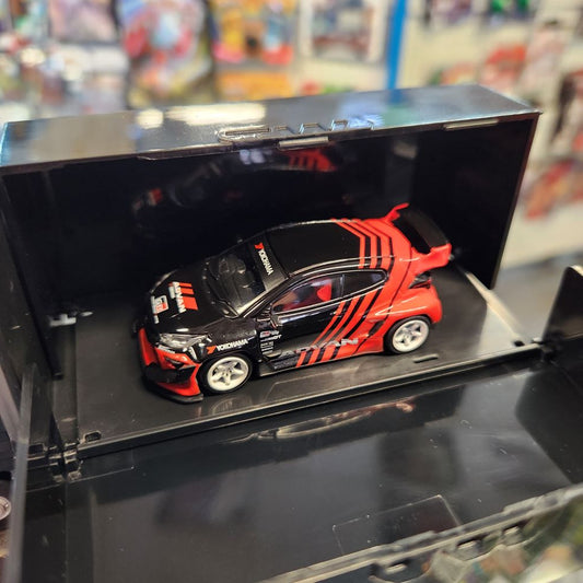 Tarmac Works - Pandem Yaris Advan - With Truck Packaging