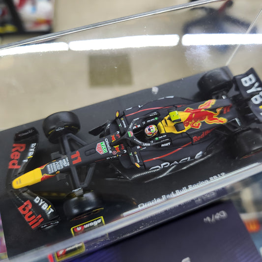 Bburago - 2023 F1 Red Bull Racing RB-19 with Driver - #11 Sergio Perez - 1:43 Scale
