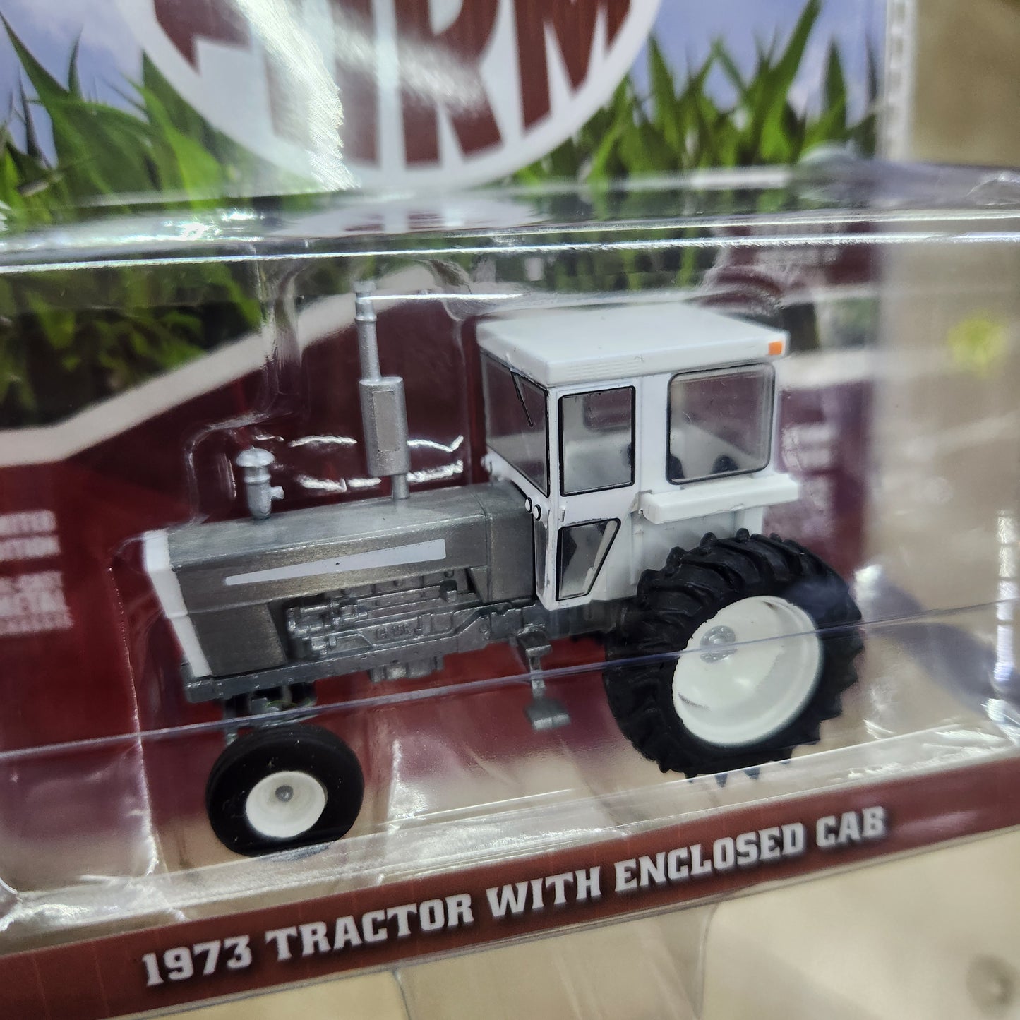 Greenlight - 'Down on the Farm' Series 9 - 1973 Tractor with Cab - 1:64 Scale