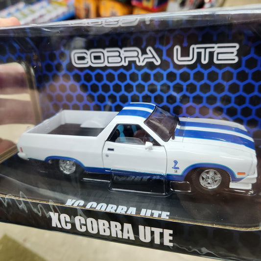 DDA - Ford Falcon XC Cobra Ute (White/Blue) - 1:32 Scale