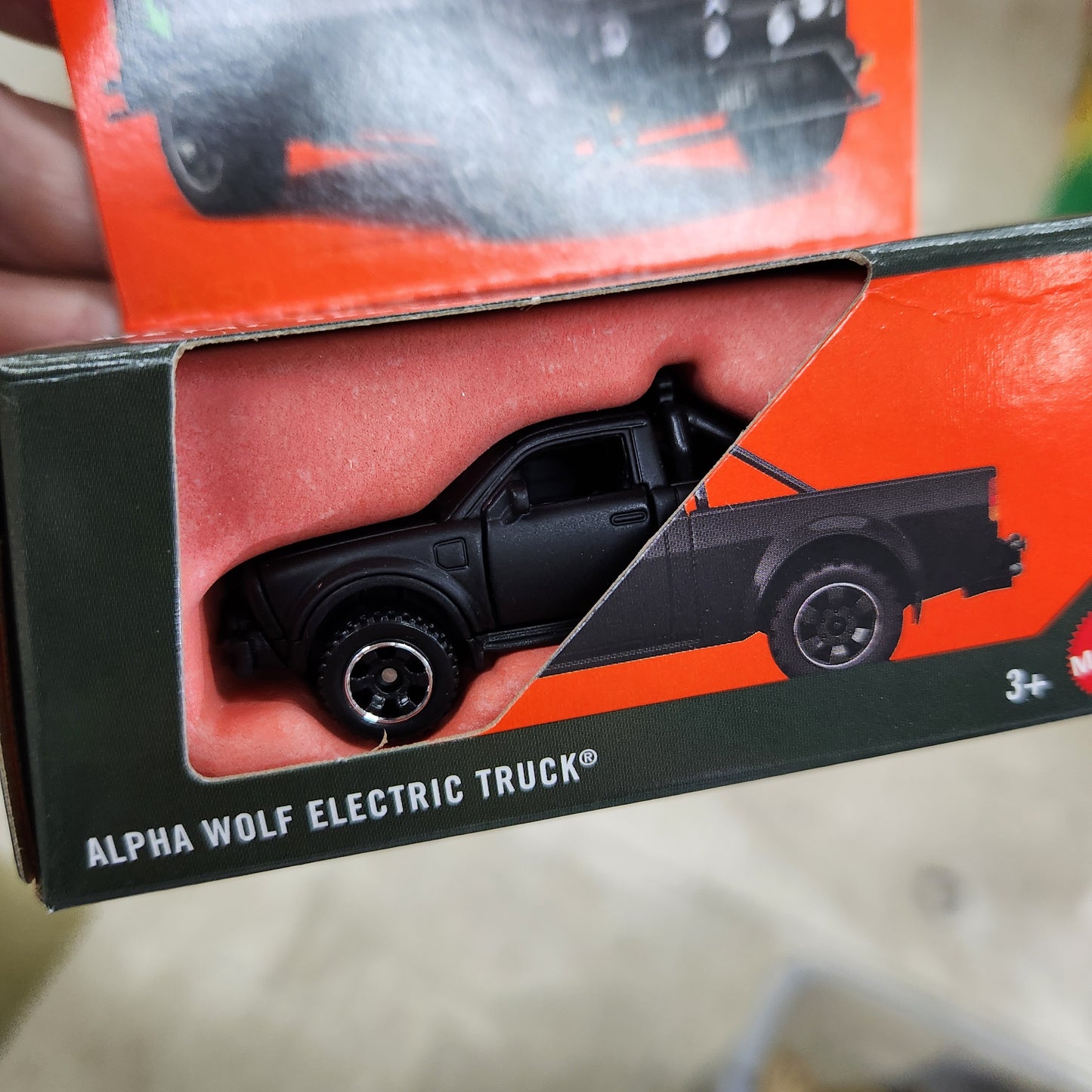 Matchbox - Moving Parts - Alpha Wolf Electric Truck (Black)
