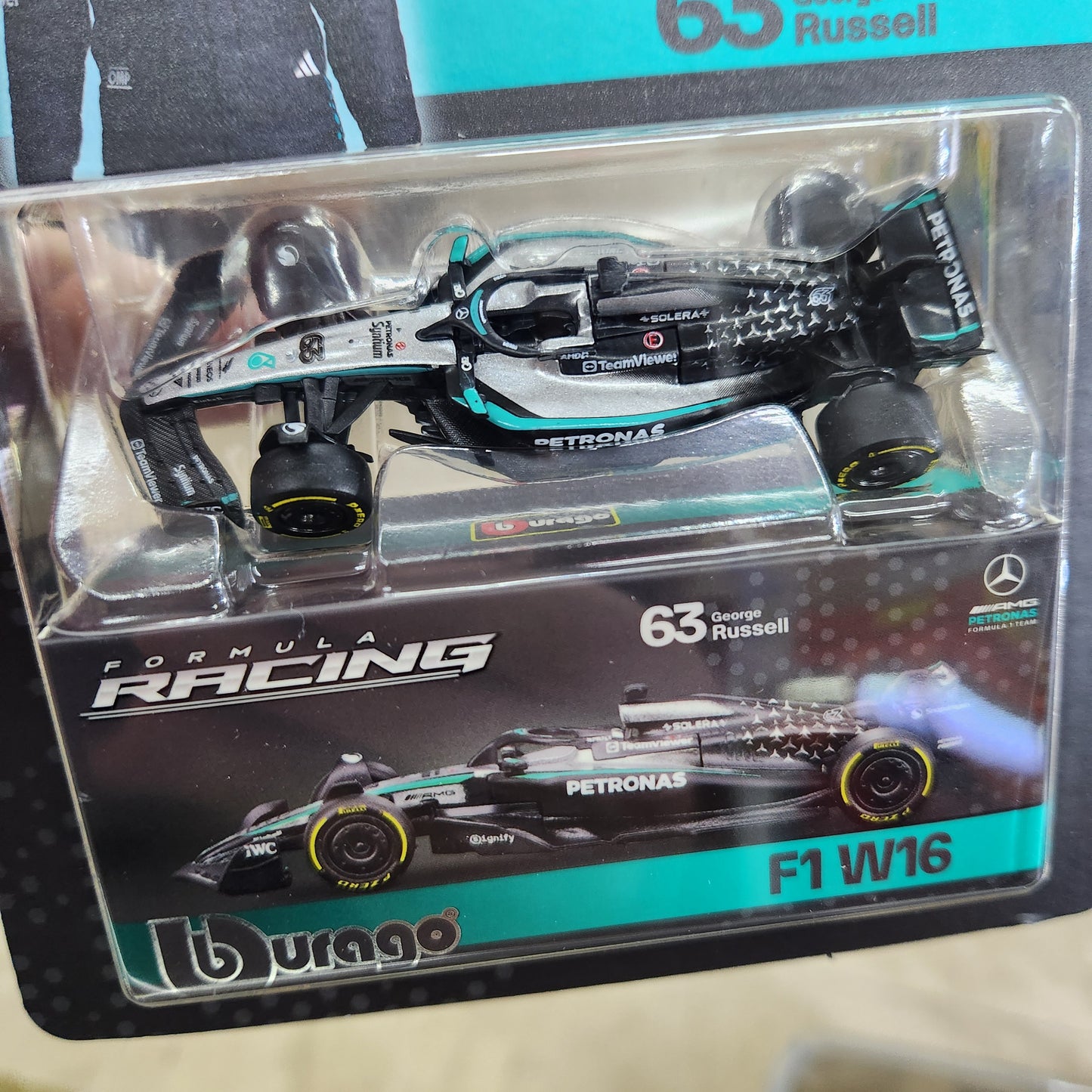 Bburago - Formula Racing - 2025 Mercedes AMG W16 with Collector Box - #63 George Russell