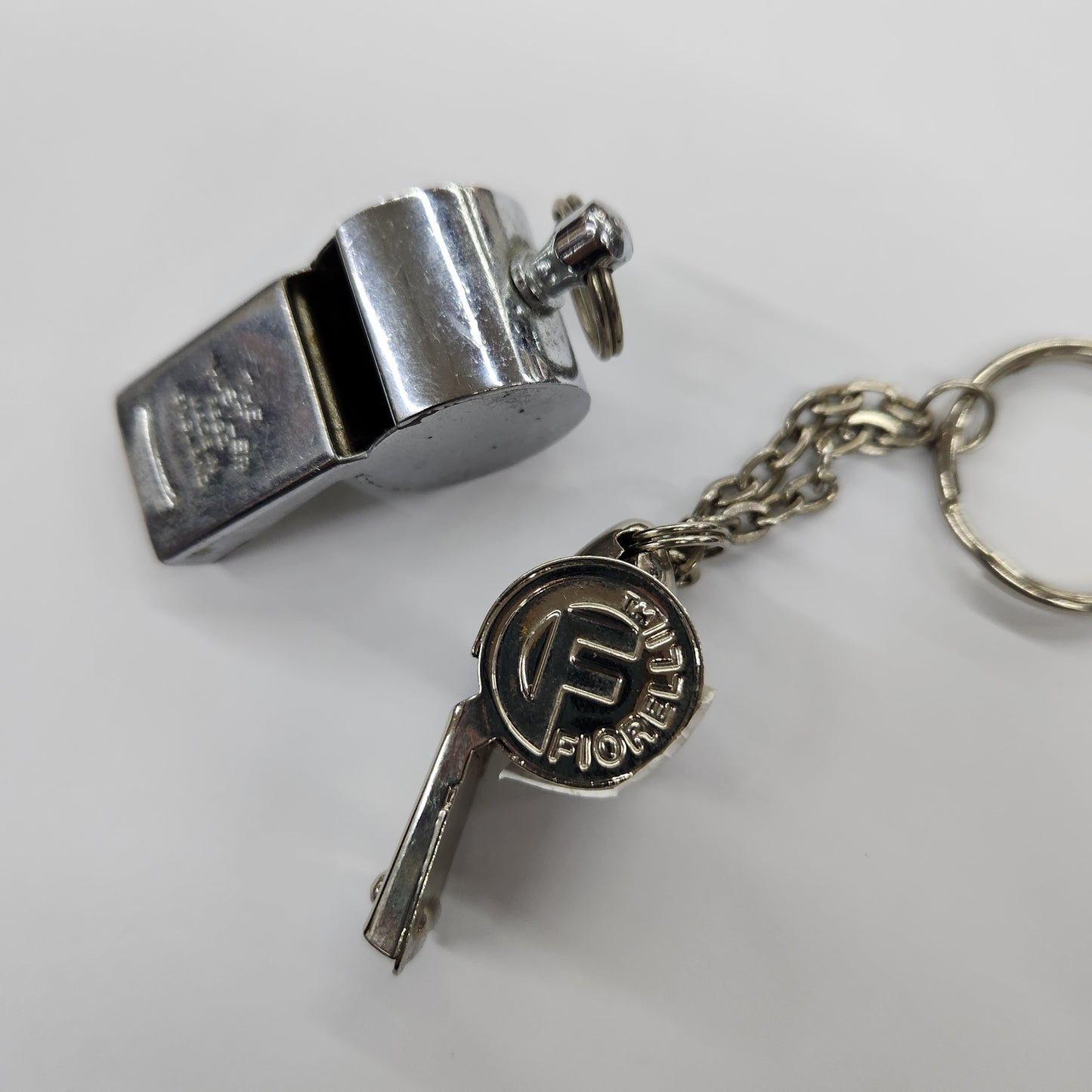 Pair of Whistles - The Hustler & Fiorelli