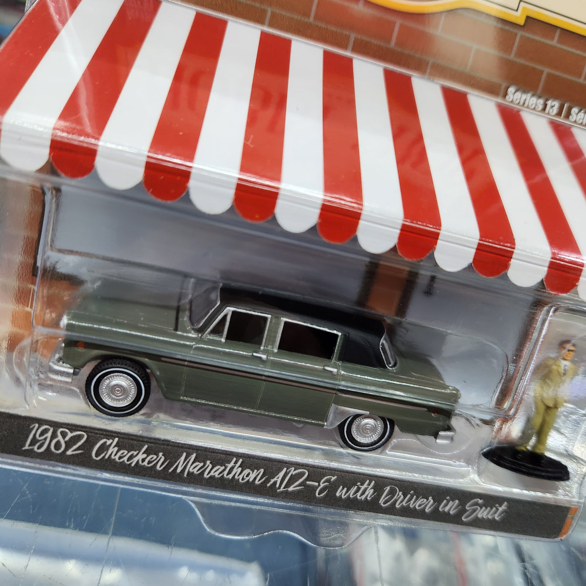 Greenlight - The Hobby Shop Series 13 - 1982 Checker Marathon A12-E with Driver