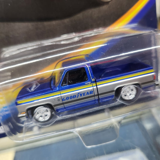 Auto World - 1983 Chevy Silverado 'Goodyear' - 1:64 Scale