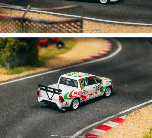 Tarmac Works - Toyota Hilux #18 'Revo' - 1:64 Scale