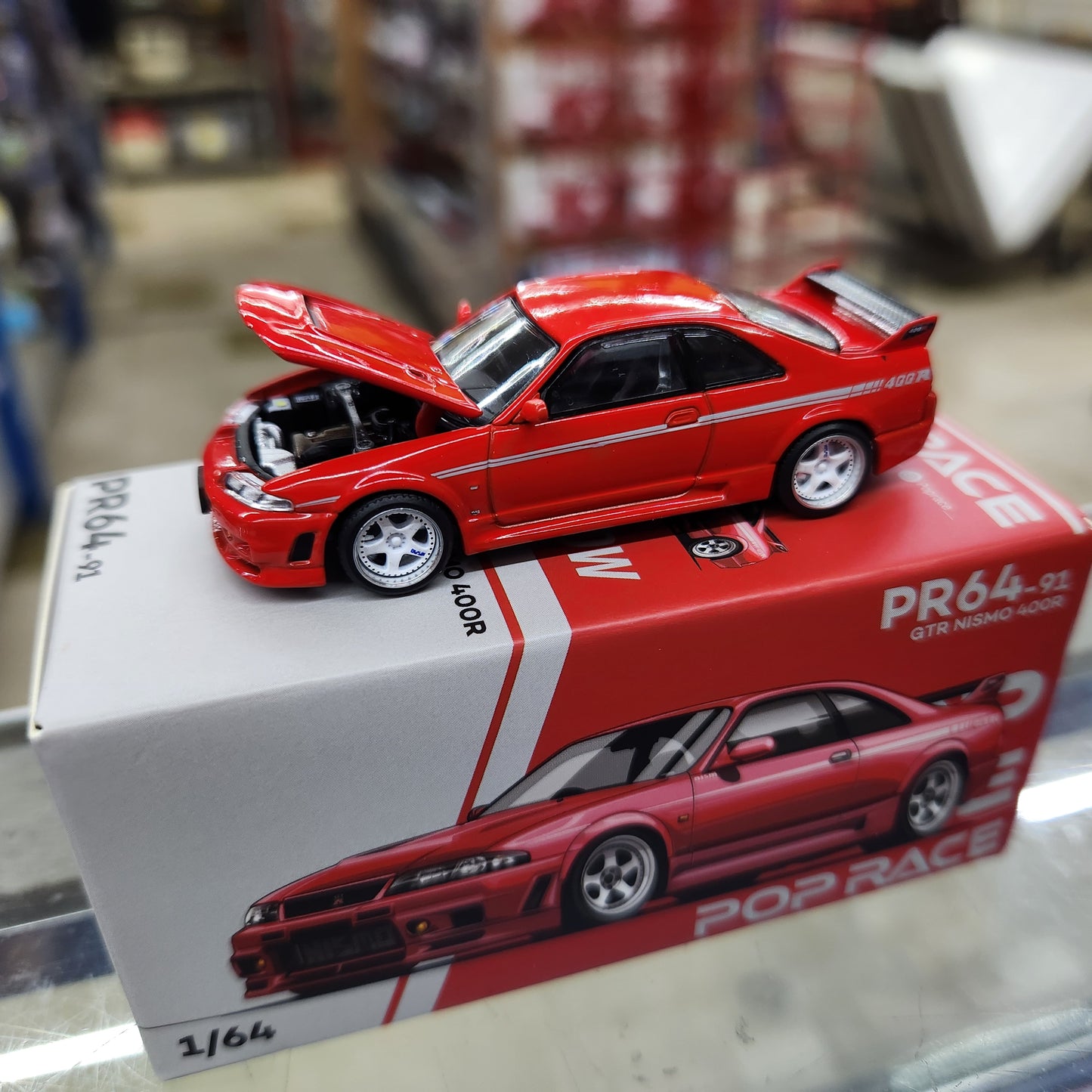 Pop Race - Nissan Skyline GT-R (R33) Nismo 400R Red - 1:64 Scale