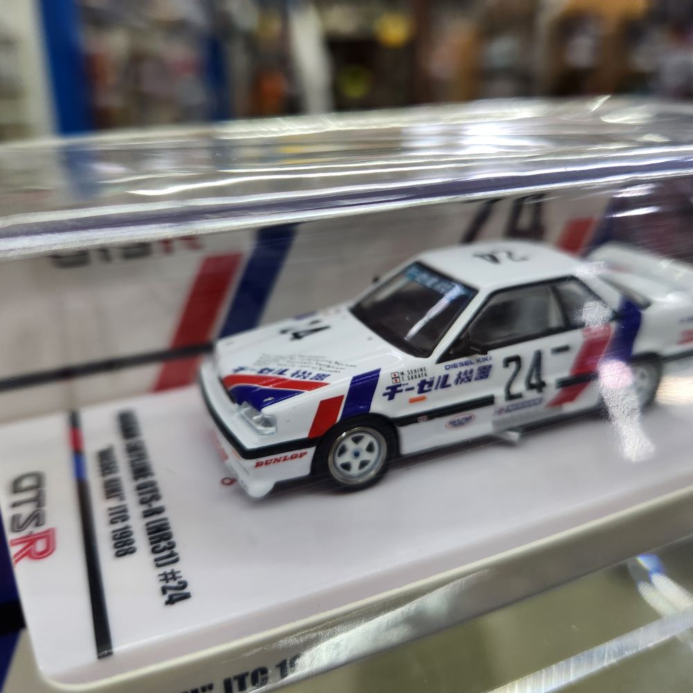 INNO64 - Nissan Skyline GTS-R (HR31) #24 'Diesel Kiki' JTC 1988 (White/Red/Blue)