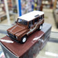 MiniGT - Land Rover 1985 Defender 110 County Station Wagon - Russet Brown