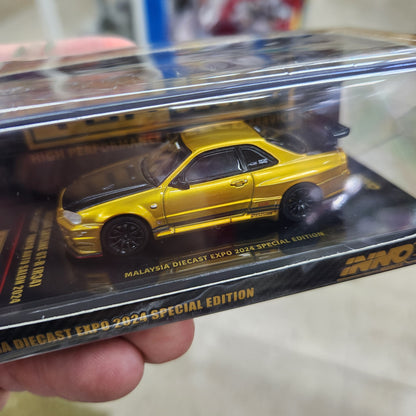INNO64 - Nissan Skyline GT-R (R34) Top Secret Tokyo Auto Salon (Gold)- 1:64 Scale