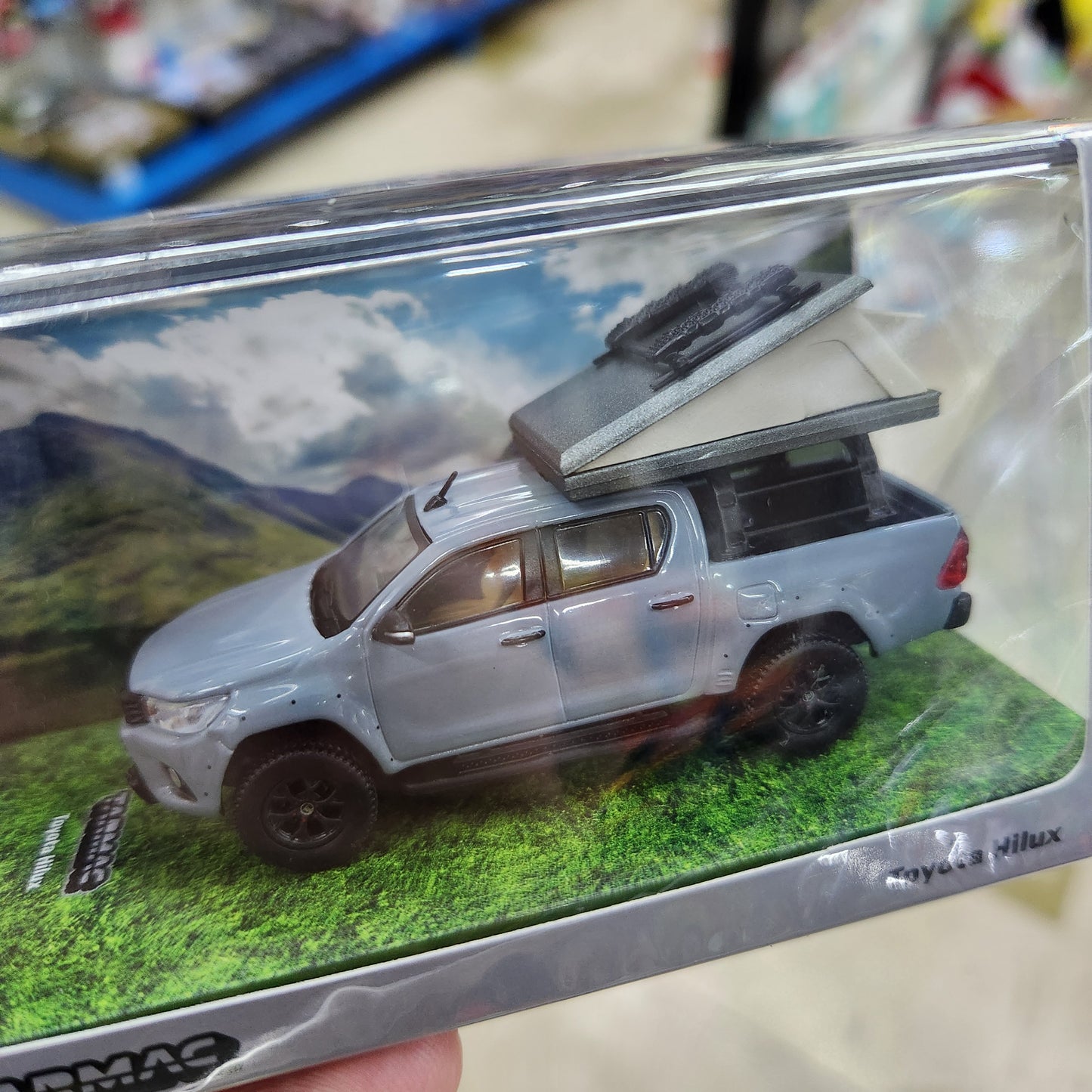 Tarmac Works - Toyota Hilux with Camping Tent - 1:64 Scale