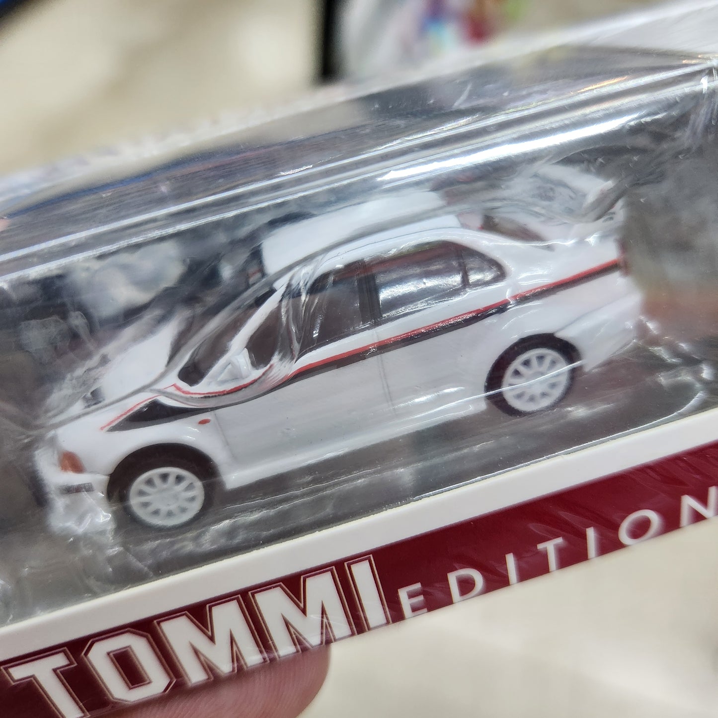 BMC - Mitsubishi Lancer Evolution VI 'Tommi Edition' (White) - 1:64 Scale