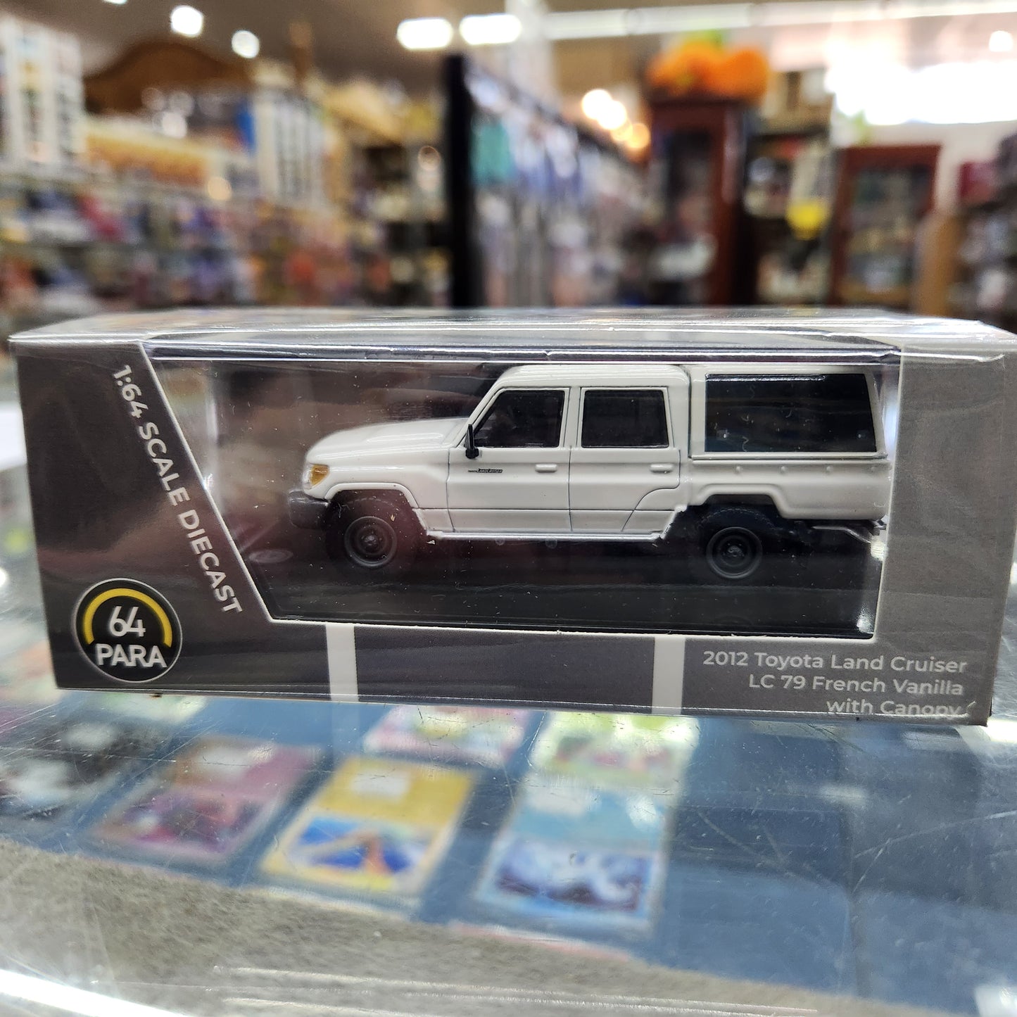 Para64  - Toyota Land Cruiser LC79 with Canopy (French Vanilla) - 1:64 Scale