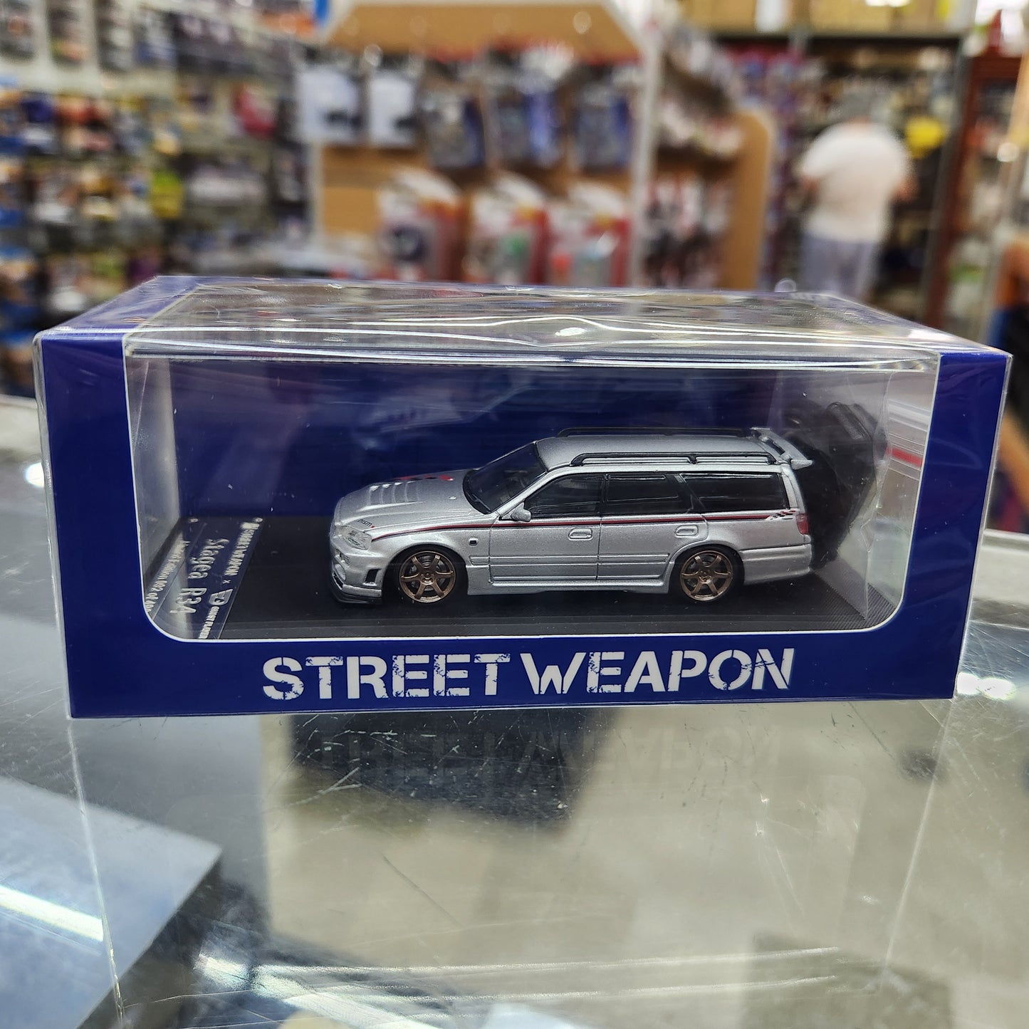 Street Weapon - Nissan Stagea (R34) Silver - 1:64 Scale