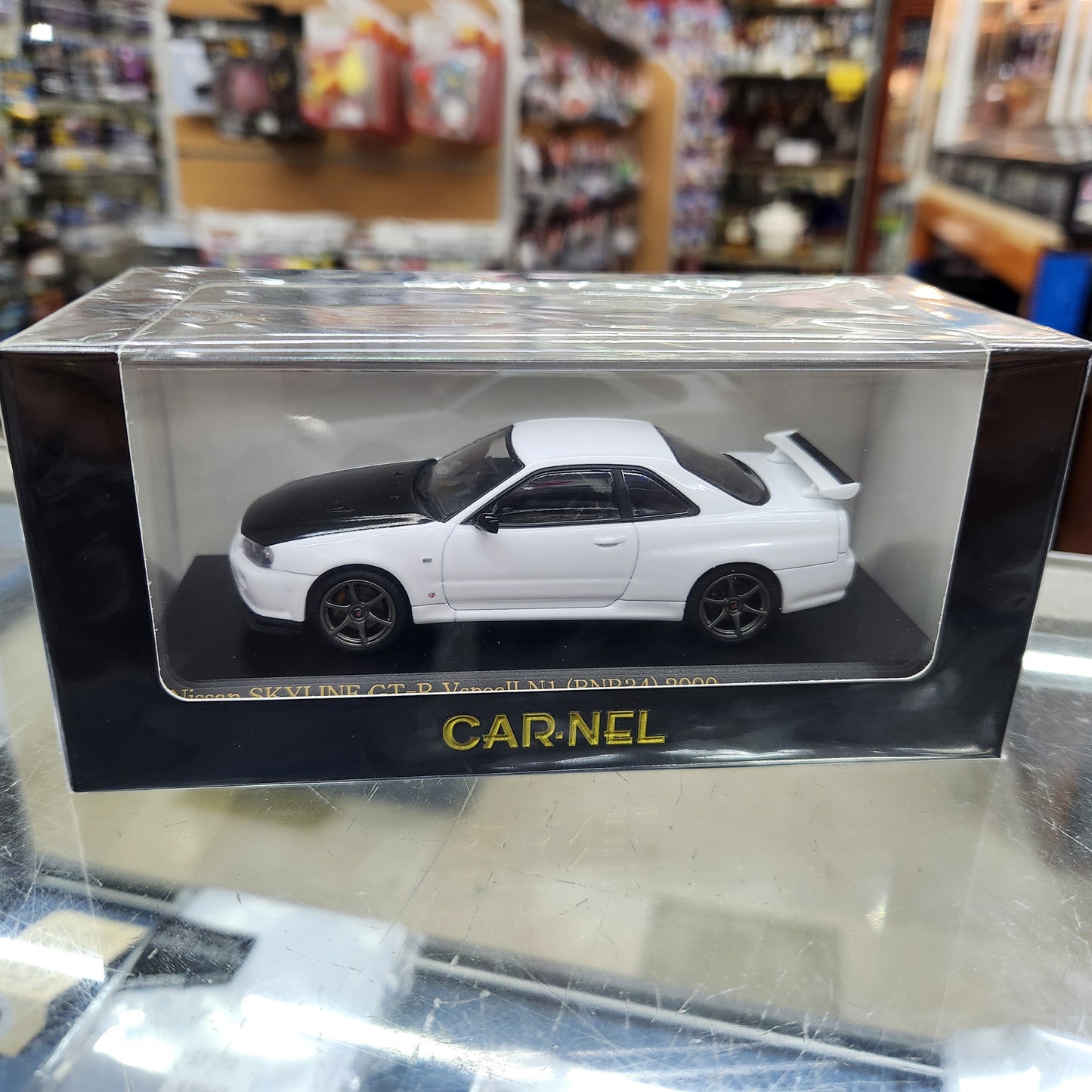 Carnel - Nissan Skyline GT-R (R34) VSpecII N1 Nur 2000 (White)- 1:43 Scale
