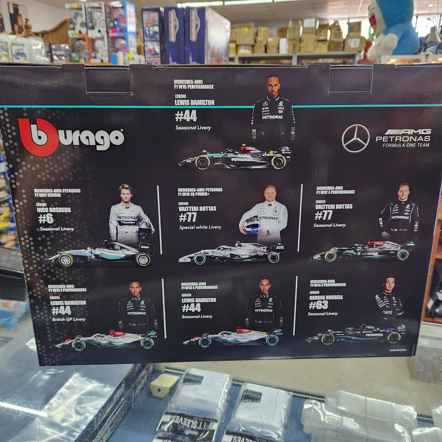 Bburago - Formula Racing - Mercedes-AMG F1 Team - 7 Car Display - 1:43 Scale