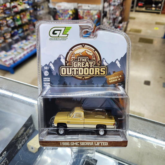 Greenlight - The Great Outdoors Series 4 - 1986 GMC Sierra Lifted (Desert Sand) with Canopy