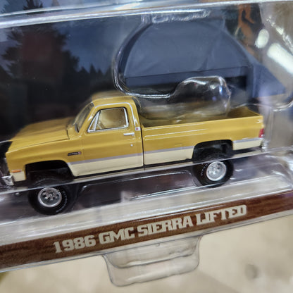 Greenlight - The Great Outdoors Series 4 - 1986 GMC Sierra Lifted (Desert Sand) with Canopy