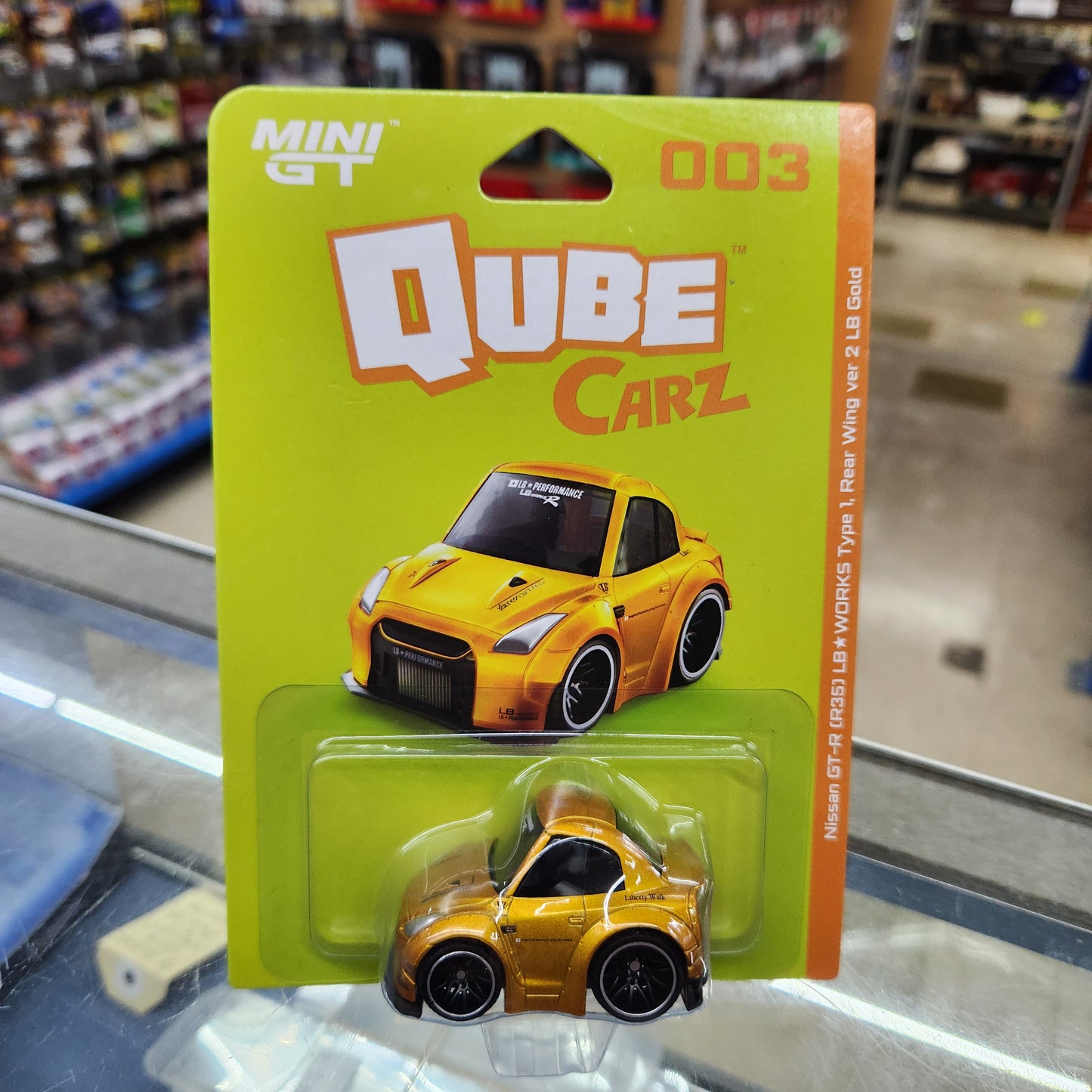 MiniGT - Qube Carz - Nissan GT-R R35 LB Liberty WORKS Type 1, Rear Wing Ver 2 LB Gold