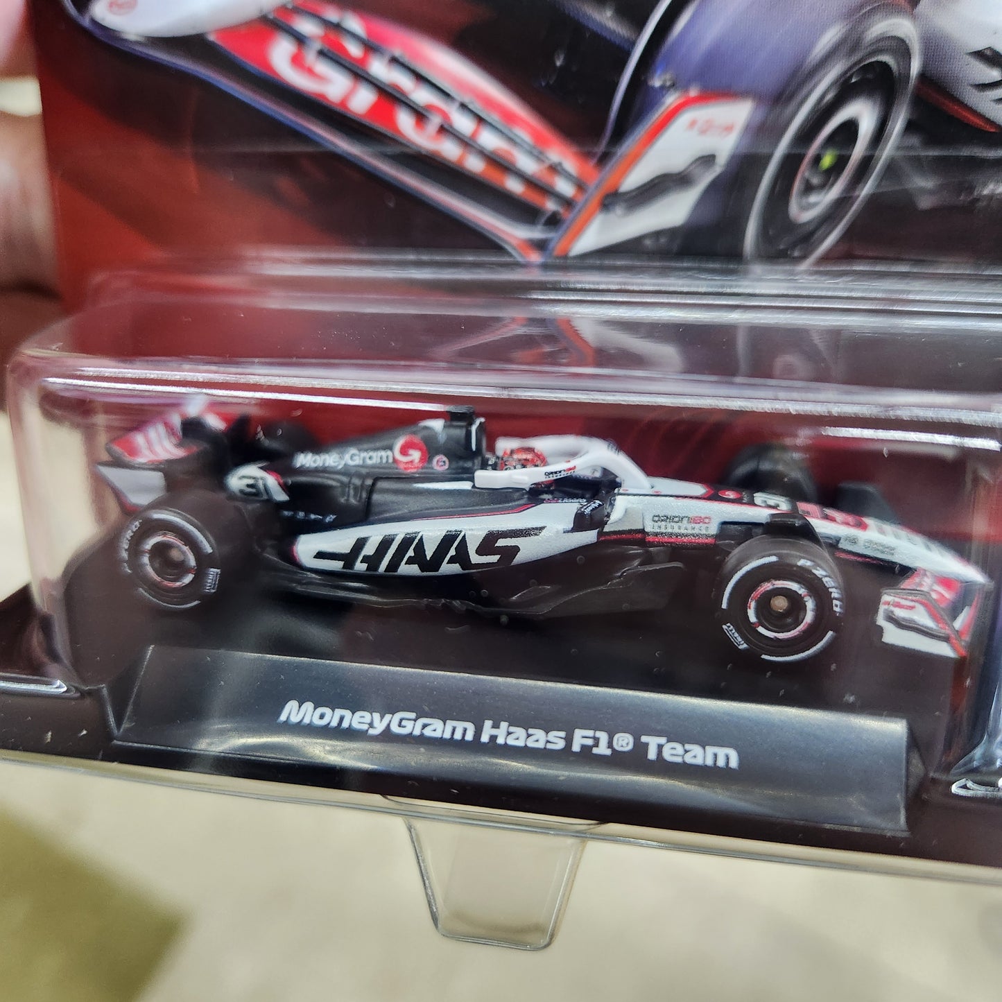 Hot Wheels Premium - 2025 Formula 1 Moneygram Haas F1 Team - #31 Esteban Ocan