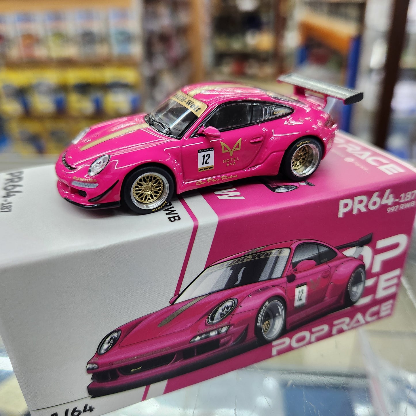 Pop Race - RWB 997 #12 'Ava Hotel' (Pink) - 1:64 Scale