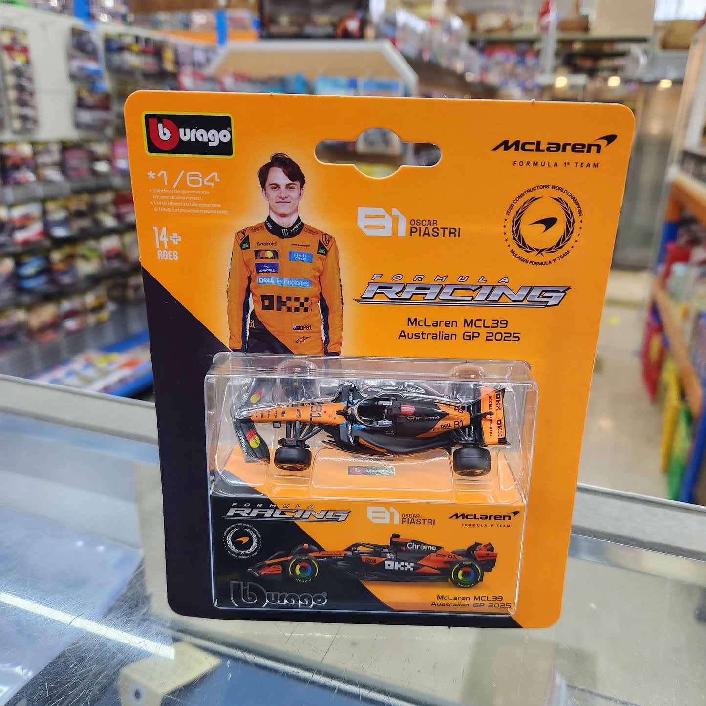 Bburago - Formula Racing - 2025 McLaren MCL39 with Collector Box - #81 Oscar Piastri