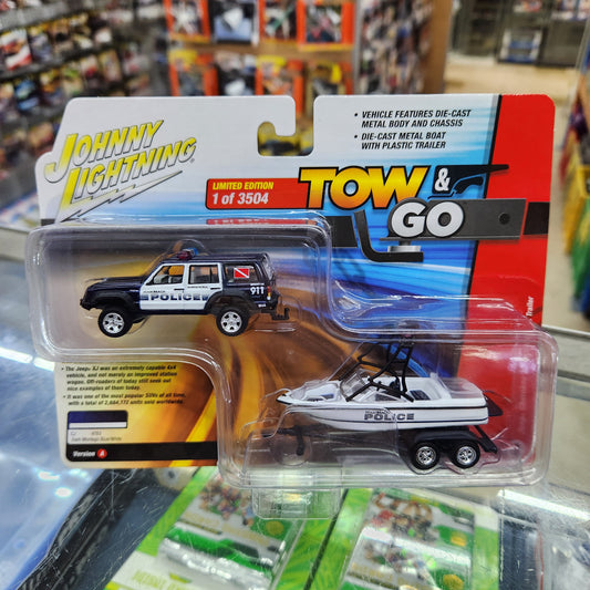 Johnny Lightning - Tow & Go Release 2 - Jeep Cherokee XJ & Boat 'Police'