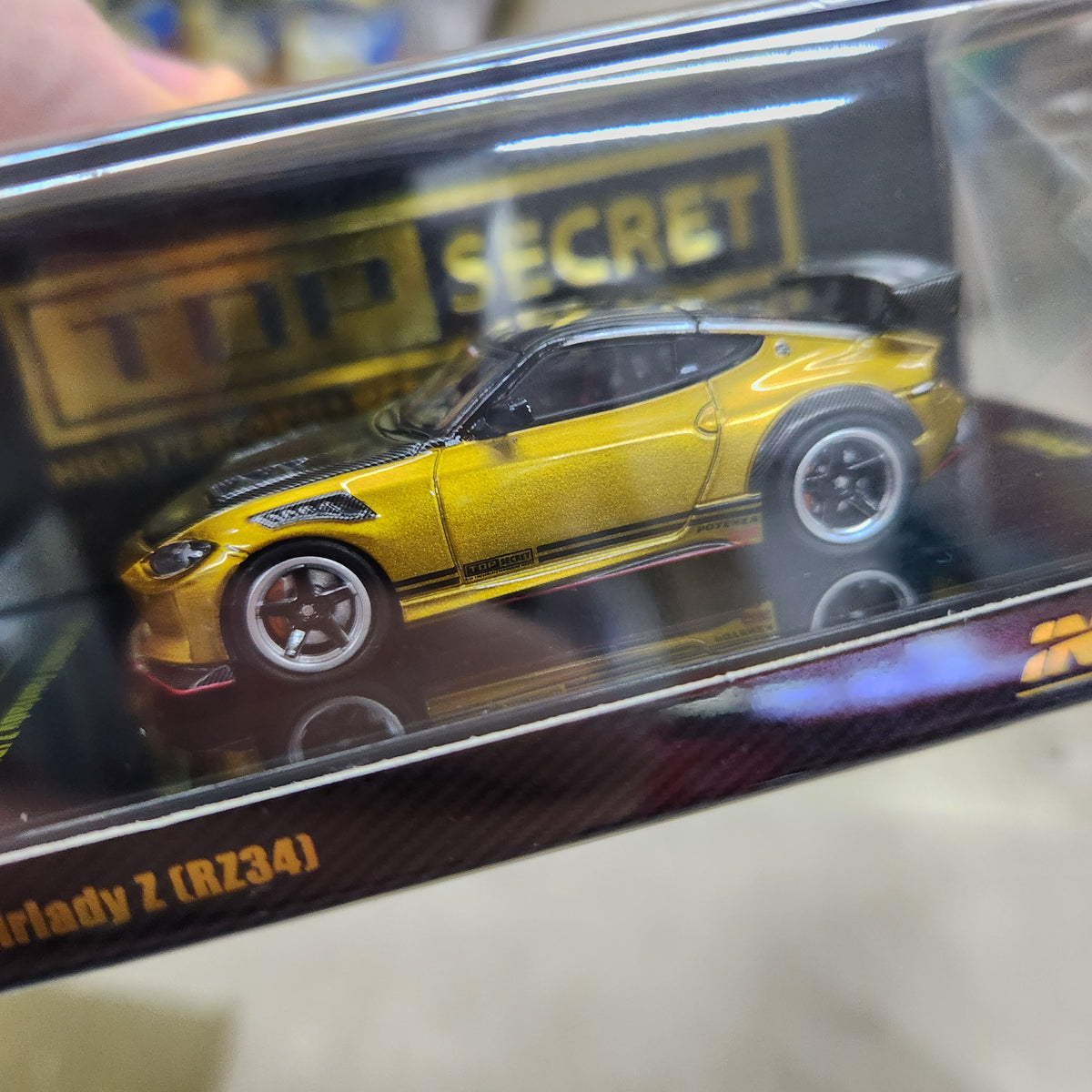 INNO64 - Nissan Fairlady Z (RZ34) 'Top Secret' Gold - 1:64 Scale