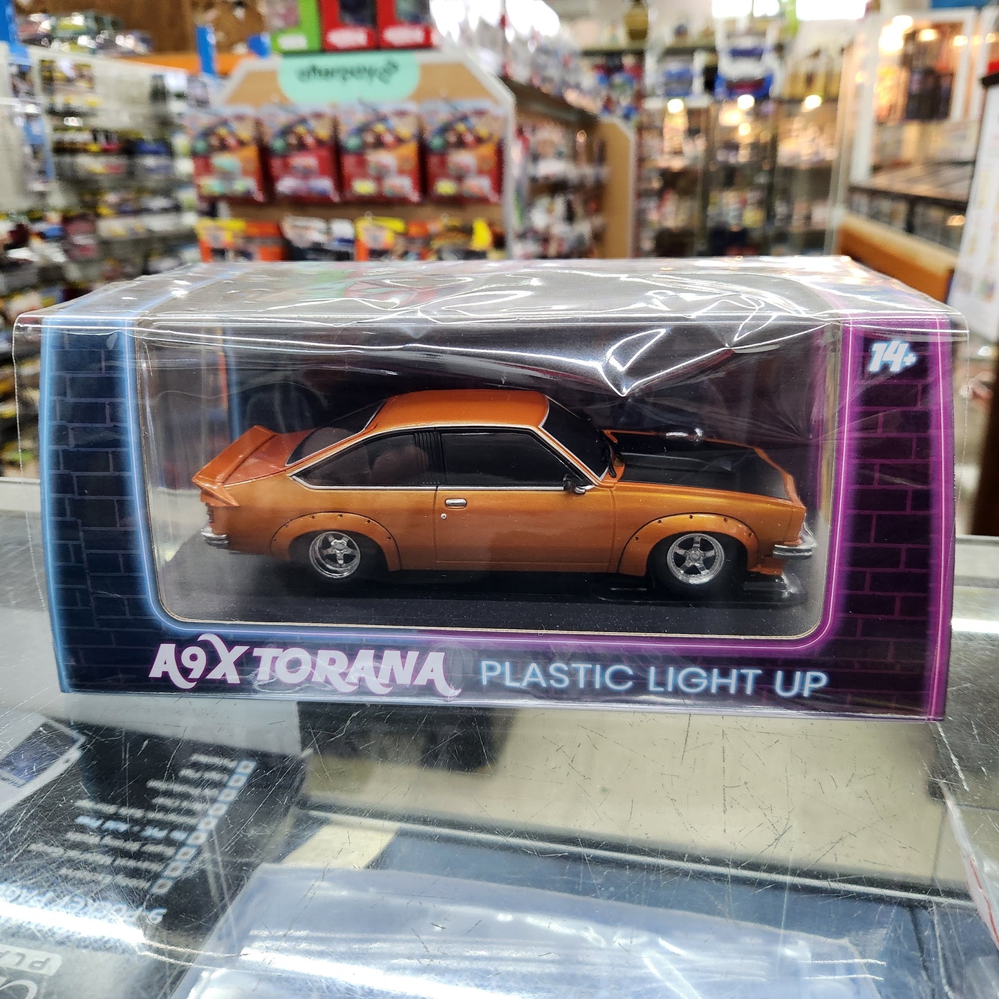 DDA  - Holden A9X Torana (Orange/Black) - Light Up - 1:64 Scale