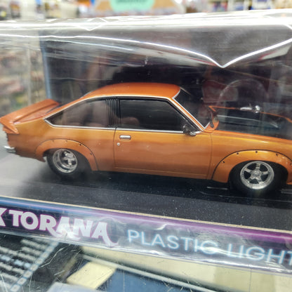 DDA  - Holden A9X Torana (Orange/Black) - Light Up - 1:64 Scale