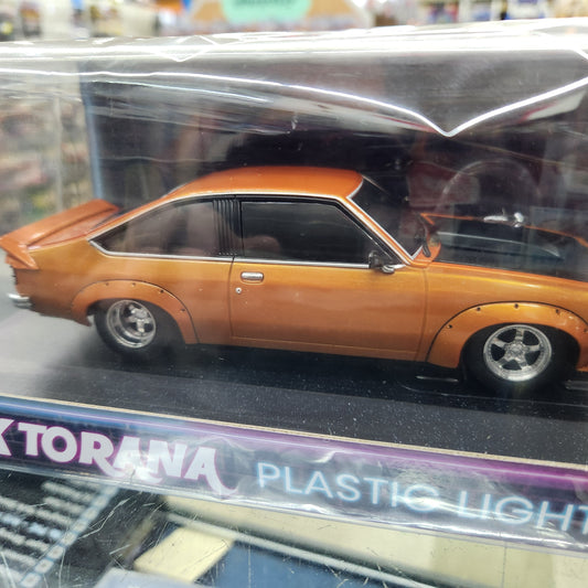 DDA  - Holden A9X Torana (Orange/Black) - Light Up - 1:64 Scale