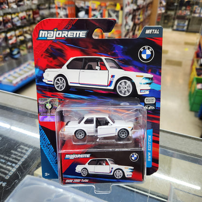 Majorette - BMW Deluxe Cars - BMW 2002 Turbo (Red/White/Blue) - 1:64 Scale