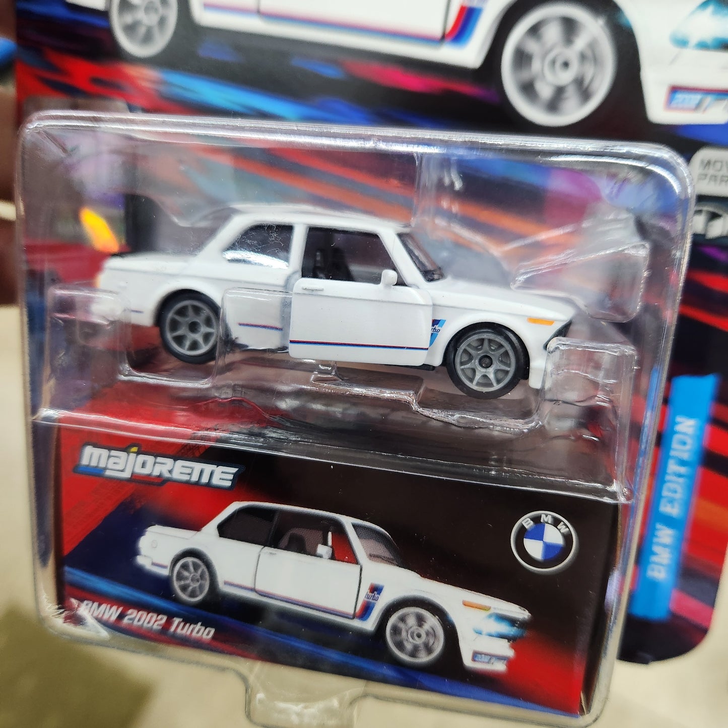 Majorette - BMW Deluxe Cars - BMW 2002 Turbo (Red/White/Blue) - 1:64 Scale