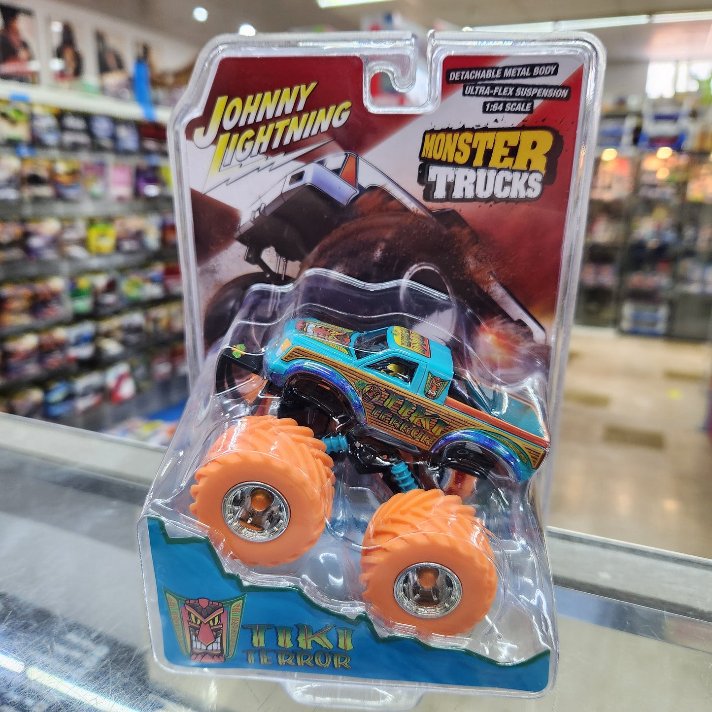 Johnny Lightning - Monster Truck - 'Tiki Terror' (Orange Wheels) - 1:43 Scale
