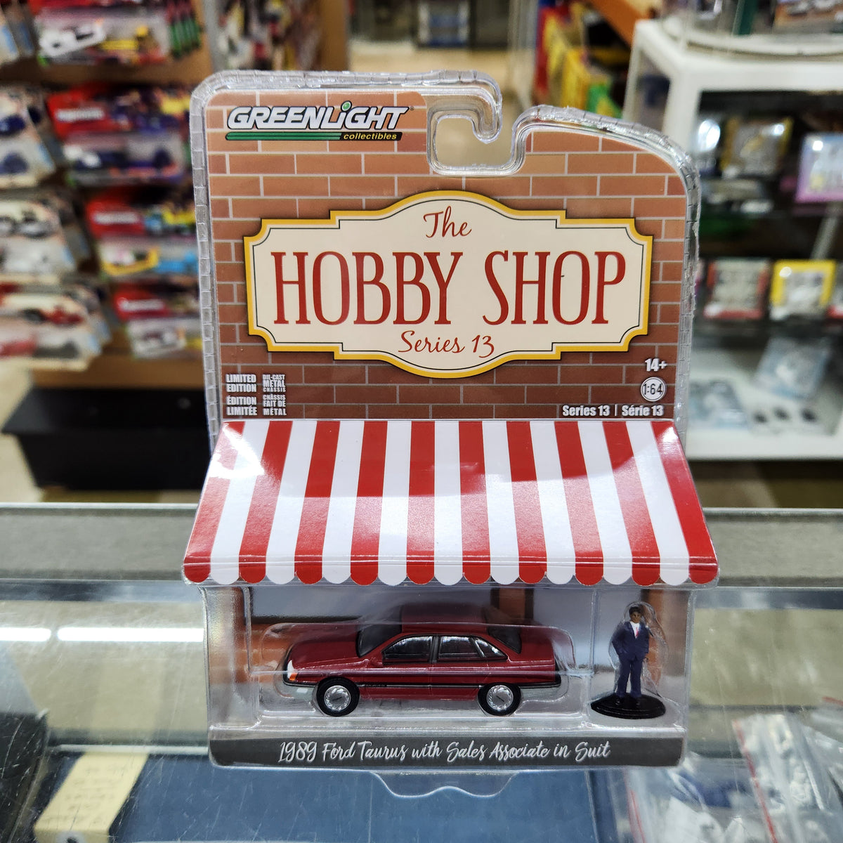 Greenlight - The Hobby Shop Series 13 - 1989 Ford Taurus with Salesman