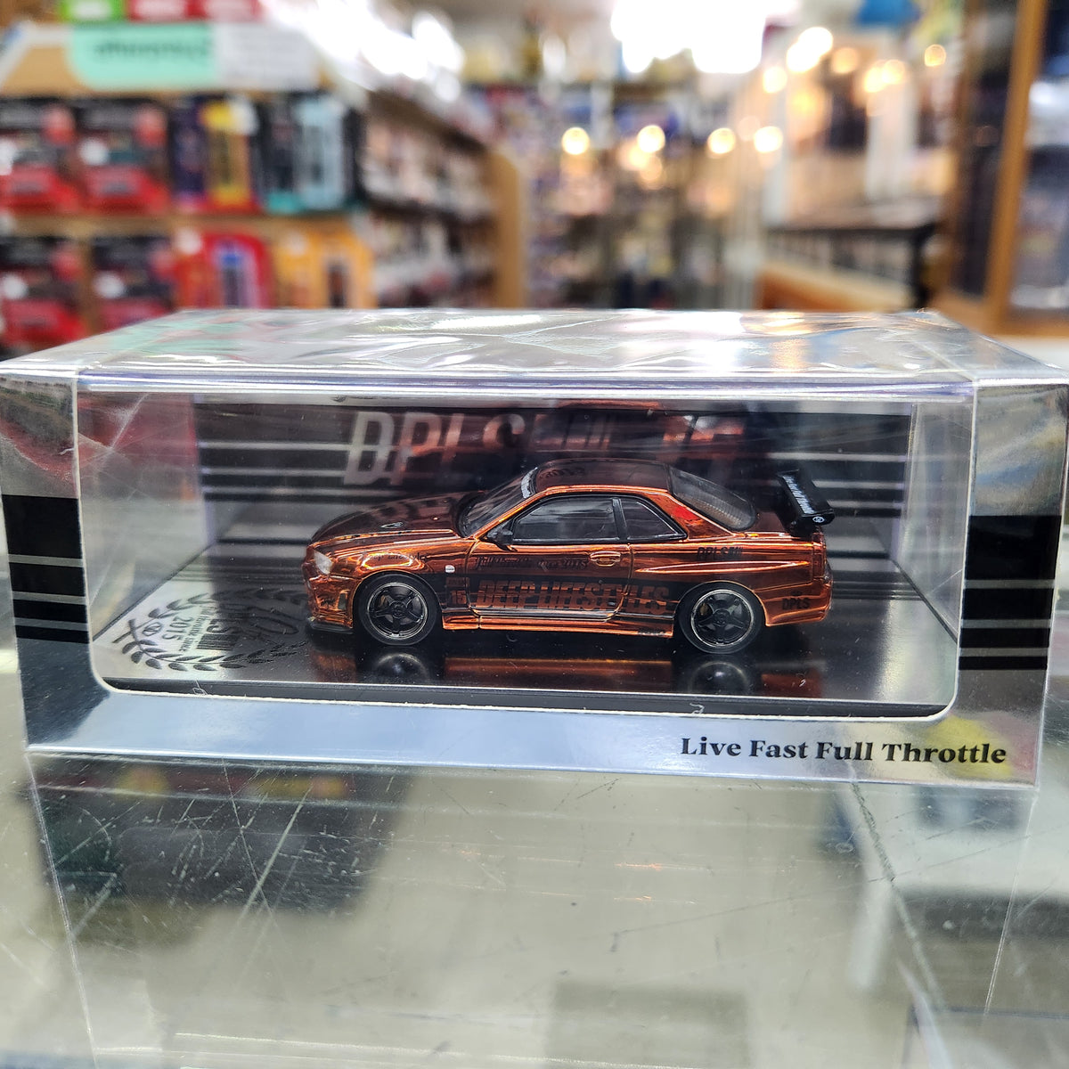 INNO64 - Nissan Skyline (R34) DPLS '10th Anniversary' (Chrome Orange)