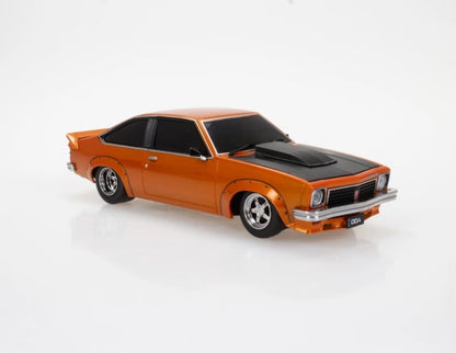 DDA  - Holden A9X Torana (Orange/Black) - Light Up - 1:64 Scale