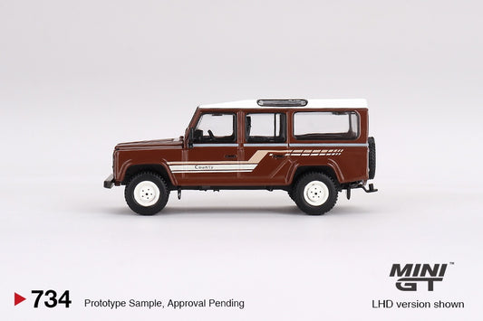 MiniGT - Land Rover 1985 Defender 110 County Station Wagon - Russet Brown