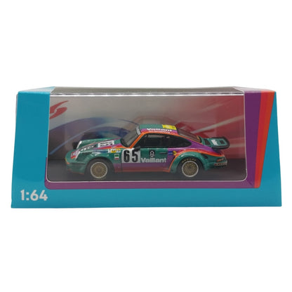 Spark - 1975 Porsche 911 Carrera RSR 3.0 #65 - 24h Le Mans (Teal/Pink) - 1:64 Scale