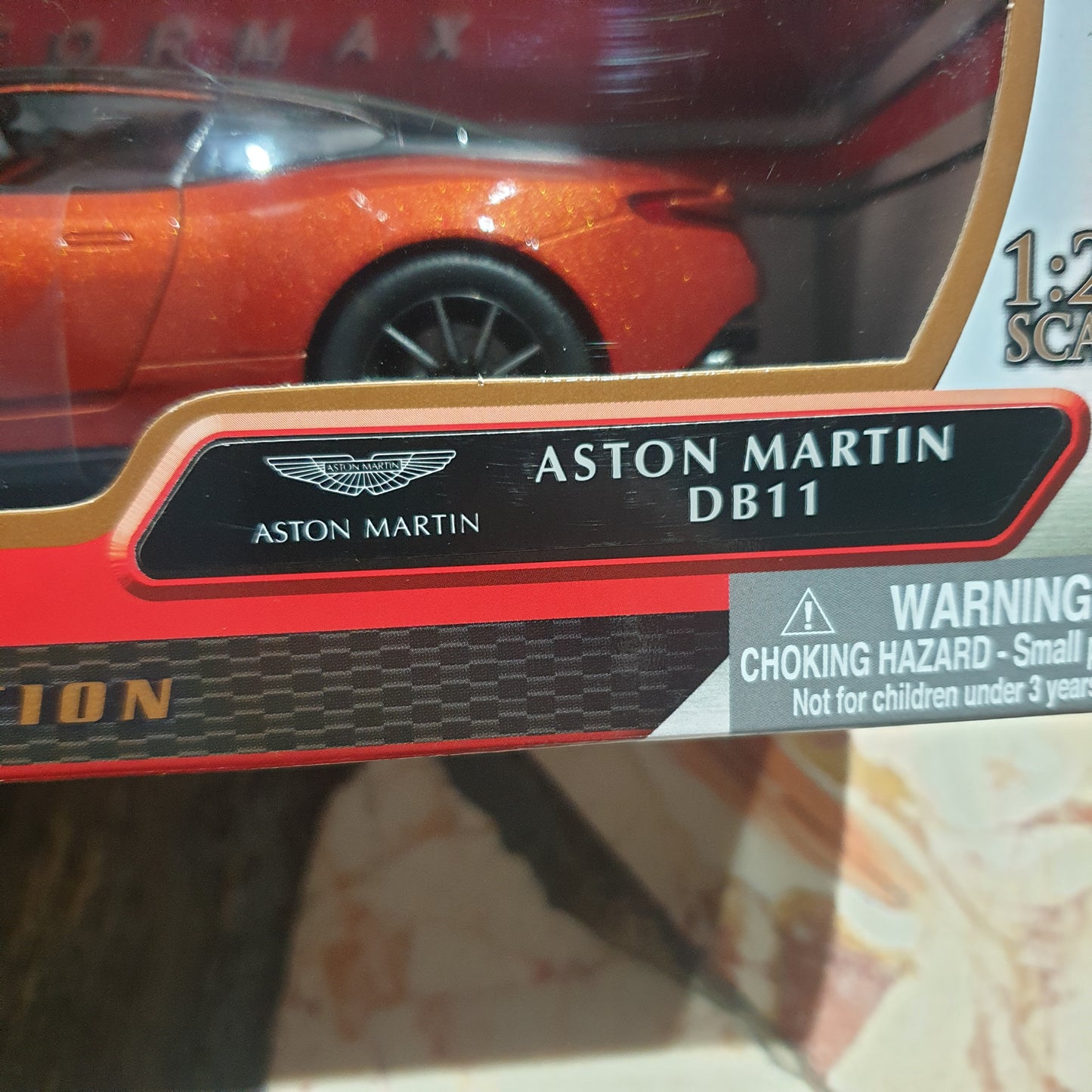 Motormax Aston Martin DB11 (Jaffa Orange) 1:24 Scale