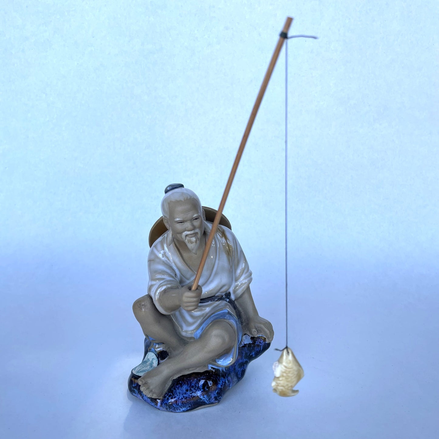 Handmade Porcelain Fisherman - 12cm